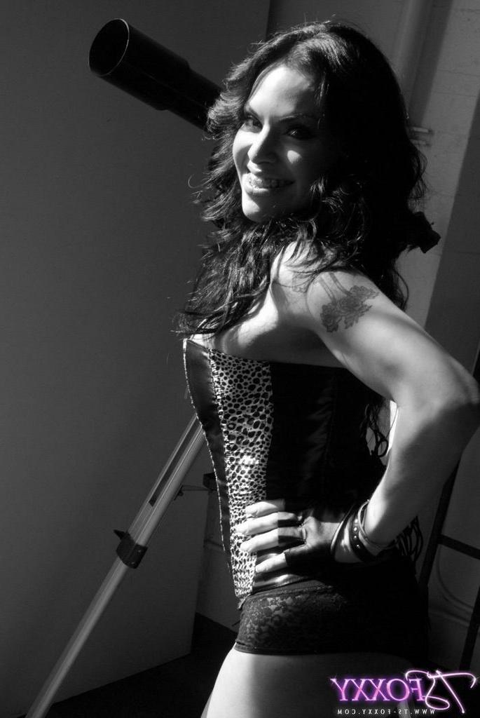 16P Sexy shemale posing in a corset