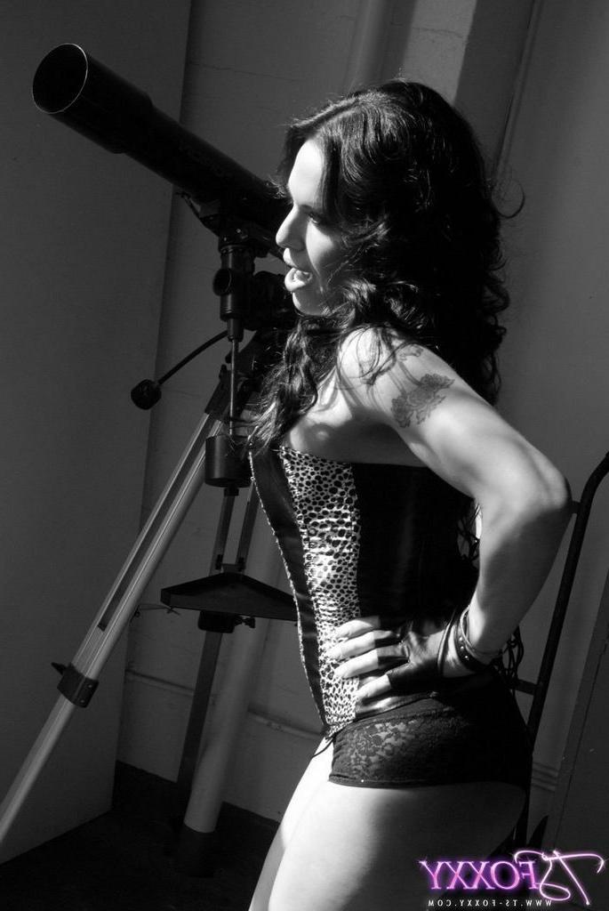 16P Sexy shemale posing in a corset