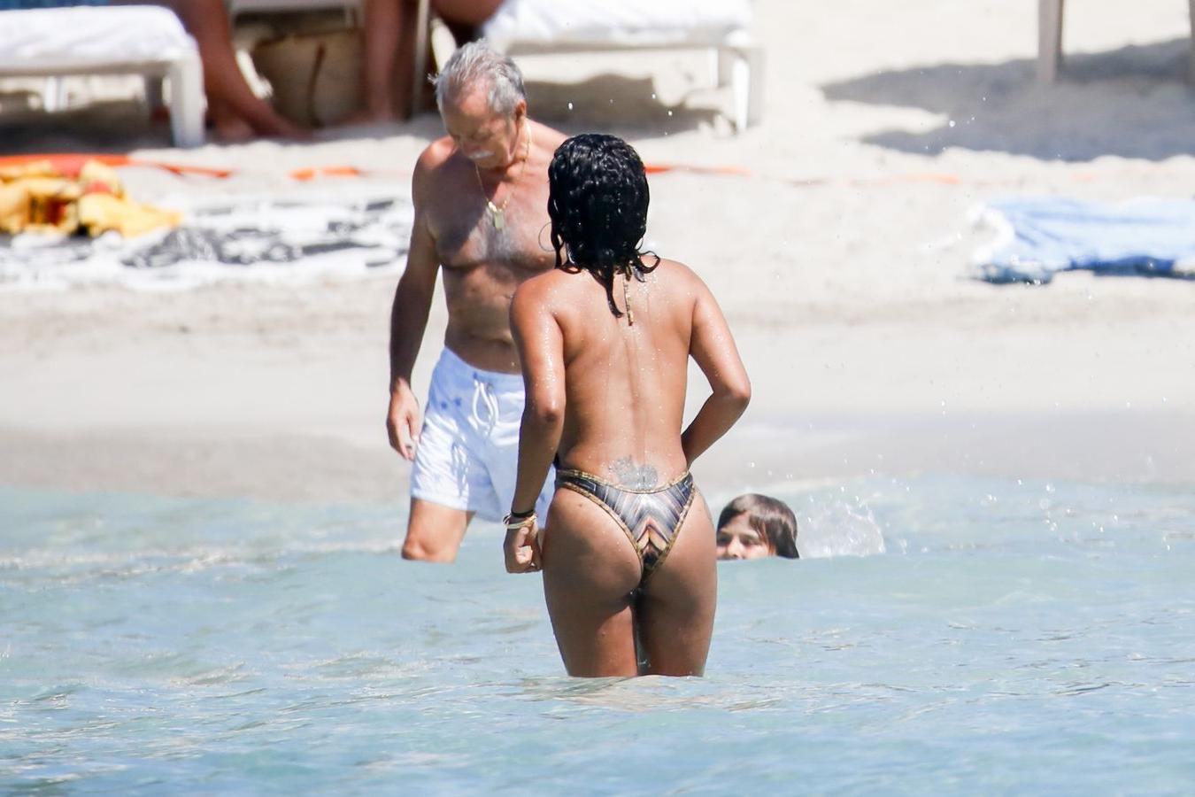 7P Christina Milian Swimsuit Photos
