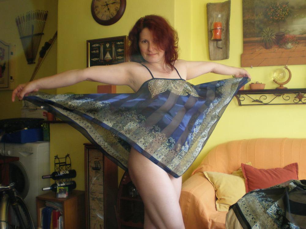 25P Pale redhead MILF public nudity lingerie and high heels