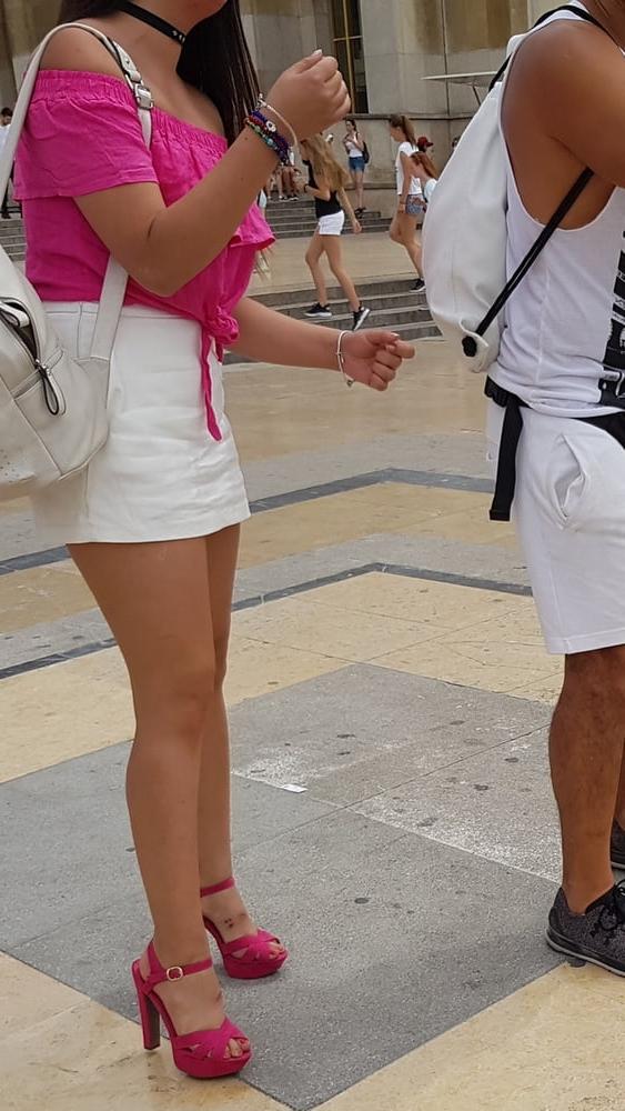 16P pretty woman in skirt, and pink heels