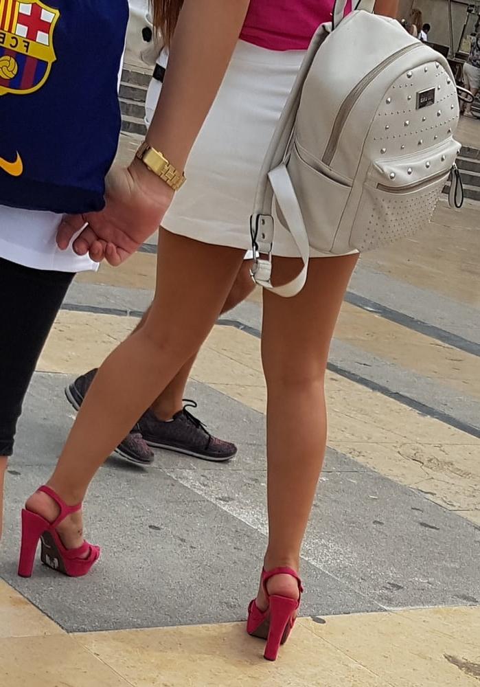 16P pretty woman in skirt, and pink heels