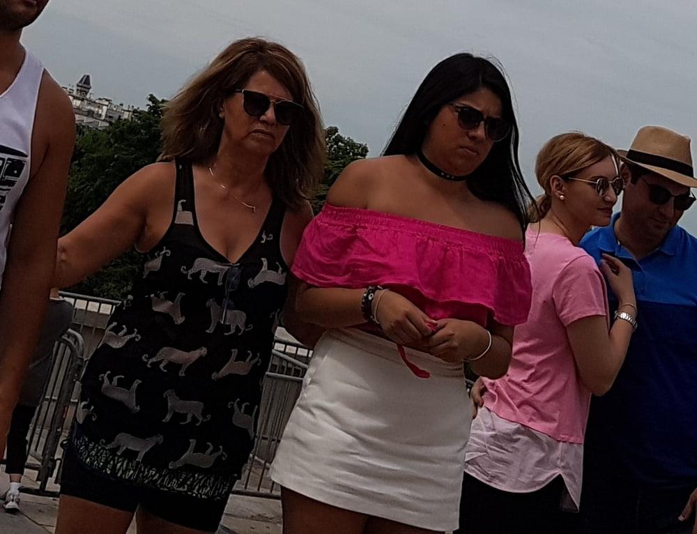 16P pretty woman in skirt, and pink heels