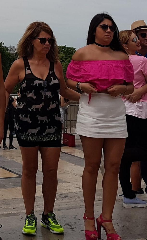16P pretty woman in skirt, and pink heels