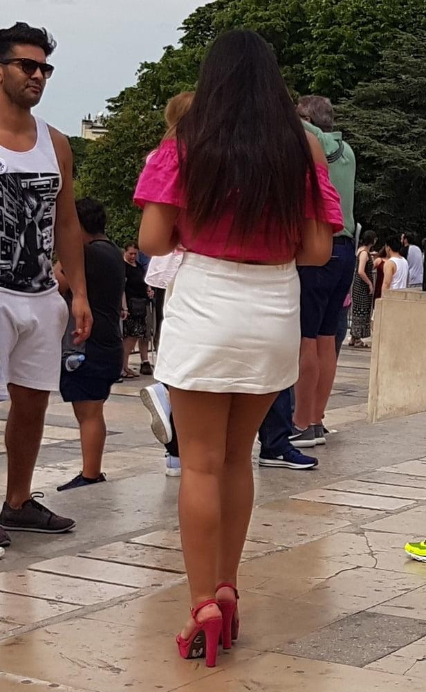 16P pretty woman in skirt, and pink heels