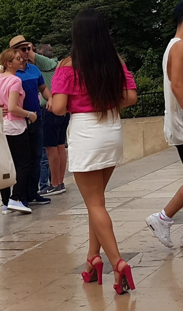 16P pretty woman in skirt, and pink heels