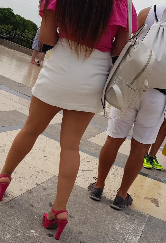 16P pretty woman in skirt, and pink heels