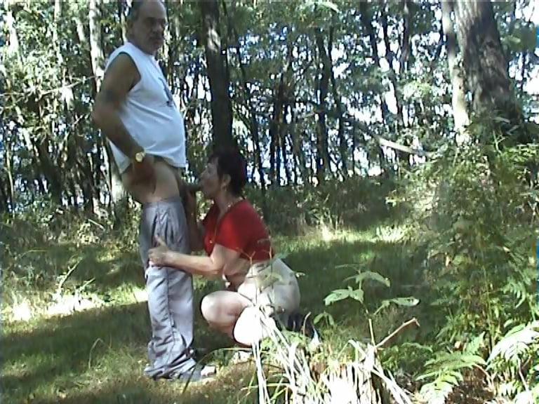 25P A little Girl stands in the forest