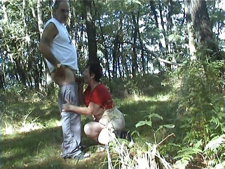 25P A little Girl stands in the forest