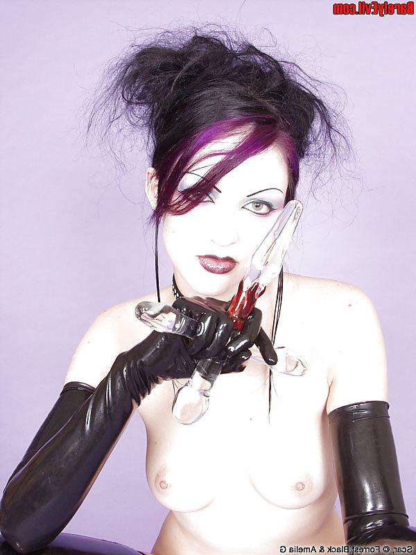 16P Goth Girl in Latex with Glass Sex Toy
