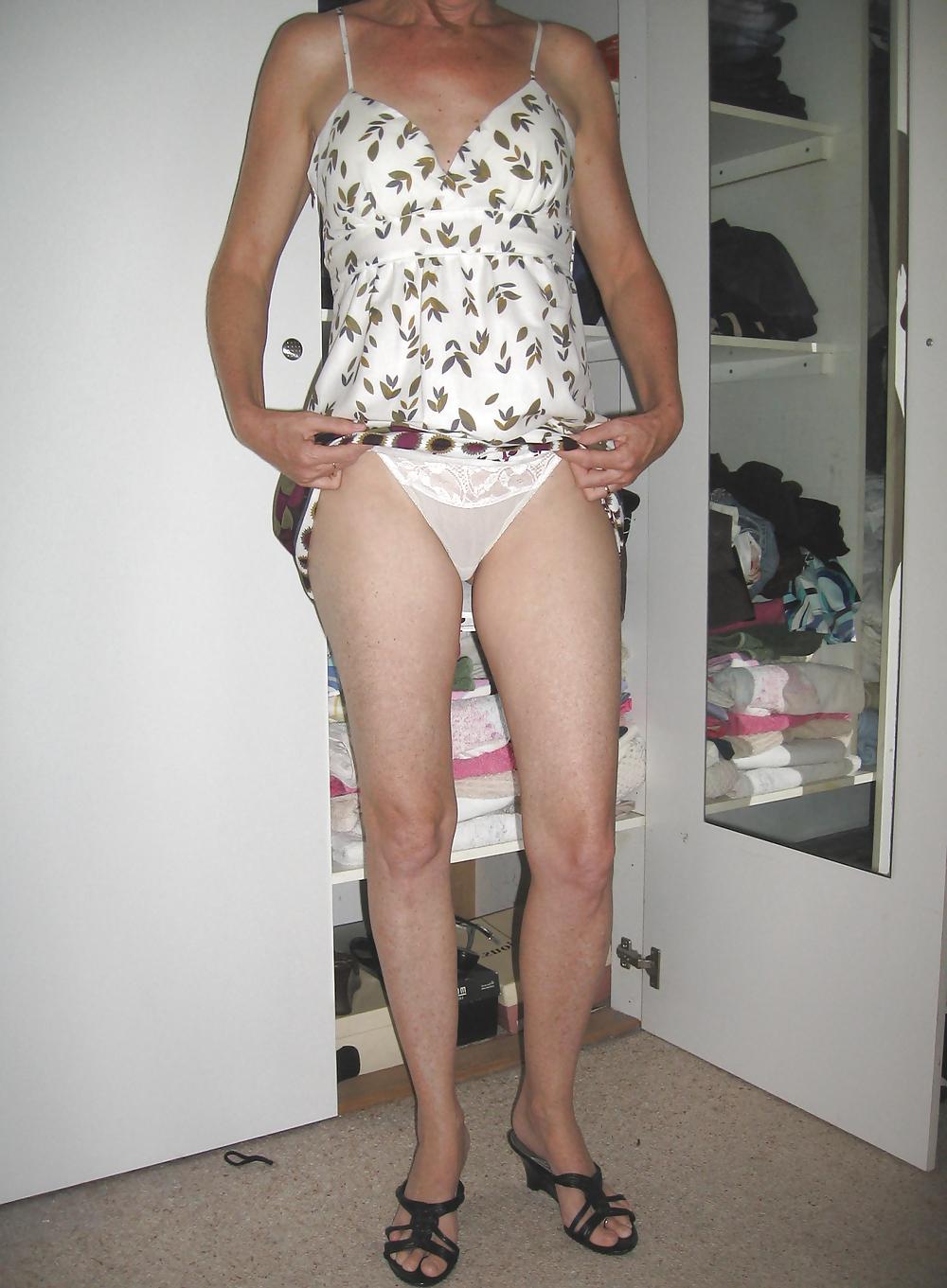 15P My redhead wife lifting up her dress