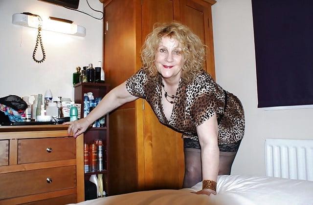 16P Non-nude granny in leopard print dress