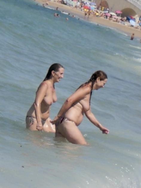 18P Busty topless beach 16