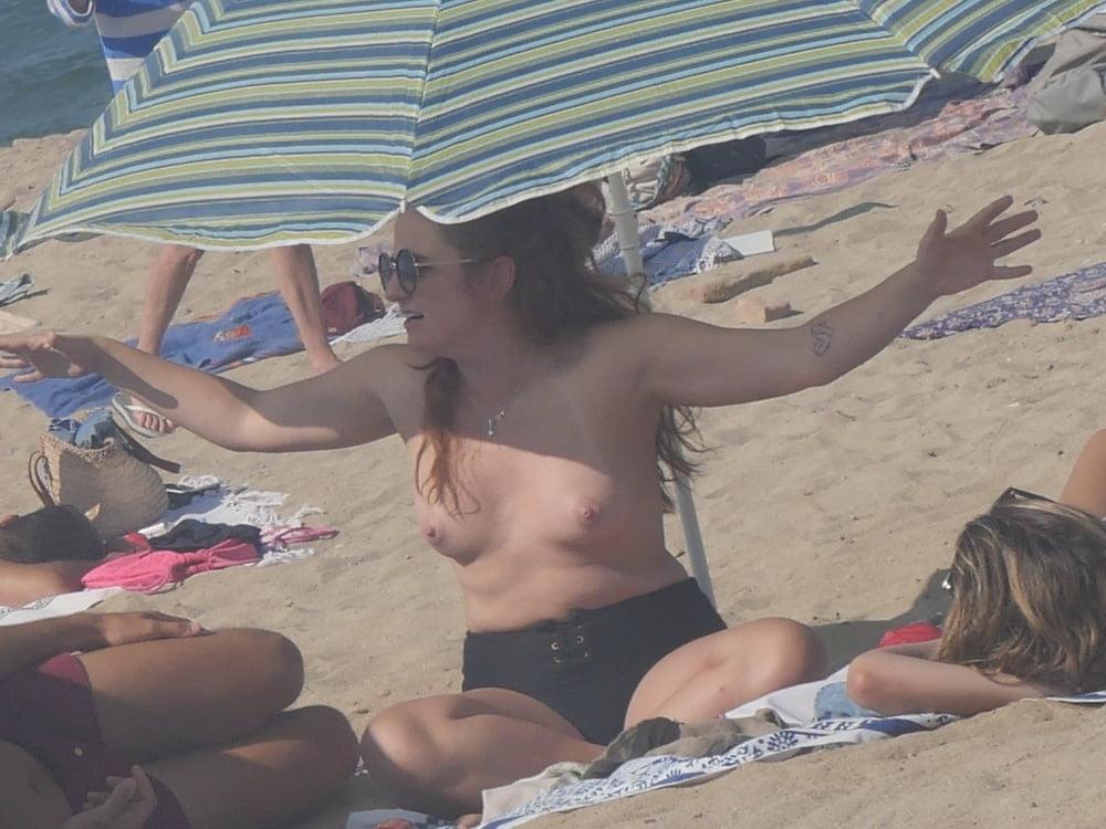 18P Busty topless beach 16