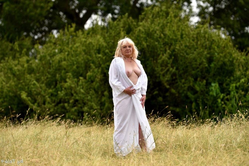 25P Blonde mature outdoor strip 2