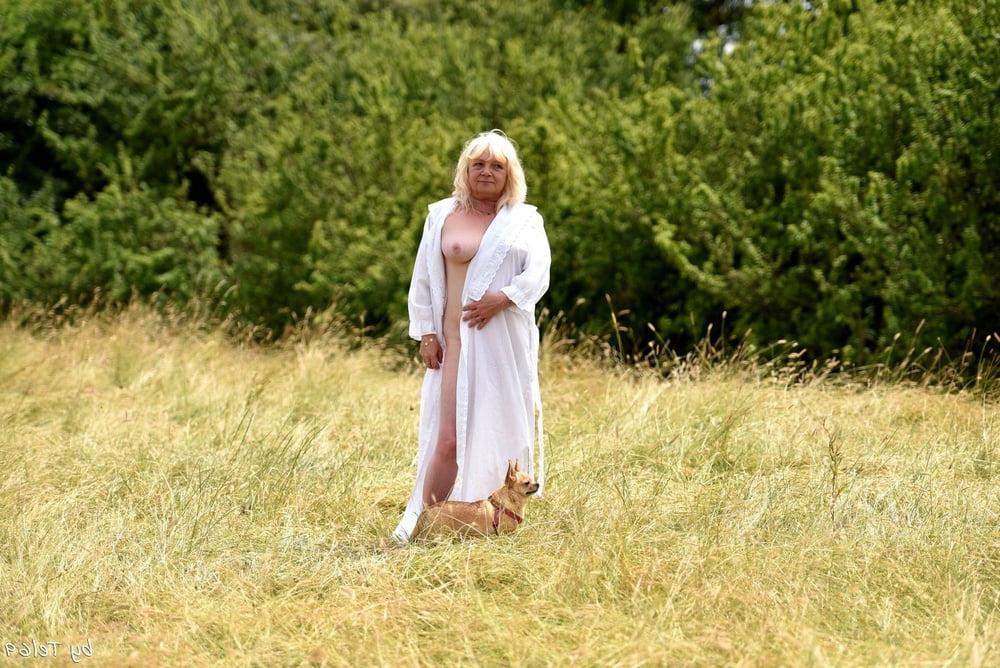 25P Blonde mature outdoor strip 2