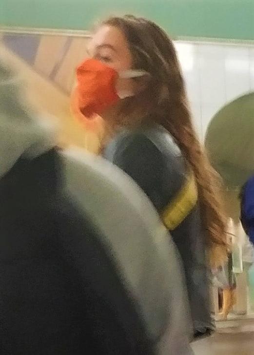 10P A french brunette masked waiting at the station