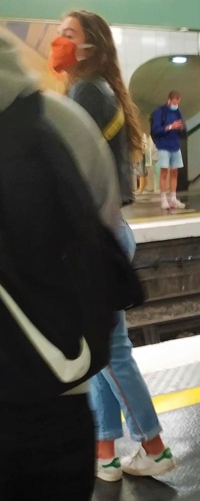 10P A french brunette masked waiting at the station