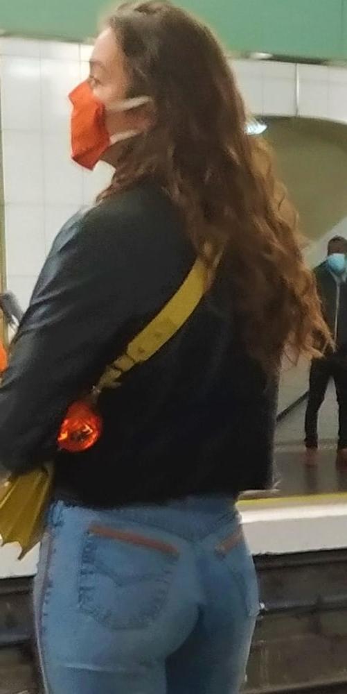 10P A french brunette masked waiting at the station