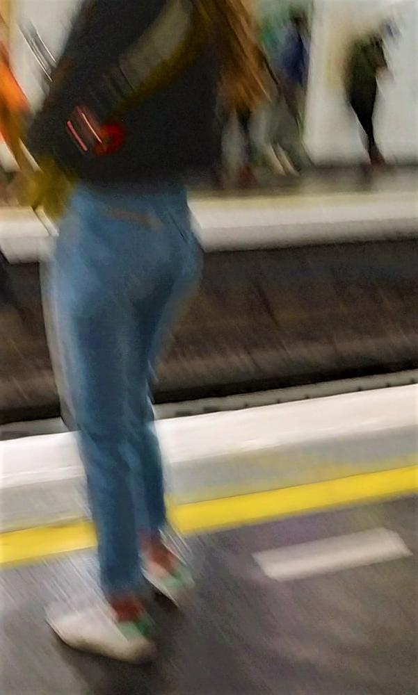 10P A french brunette masked waiting at the station