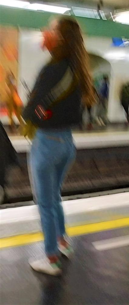 10P A french brunette masked waiting at the station