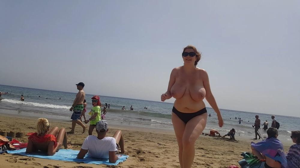 8P Busty topless beach 12
