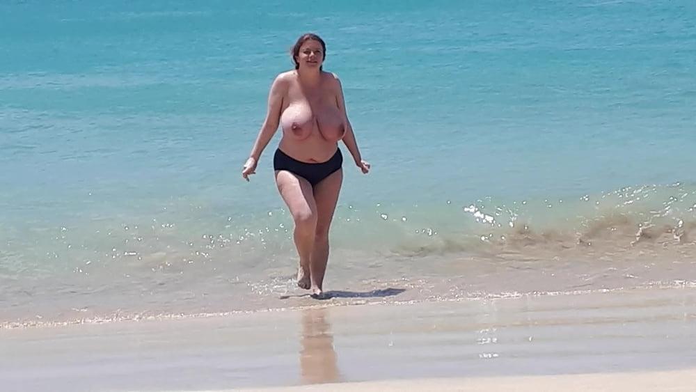 8P Busty topless beach 12