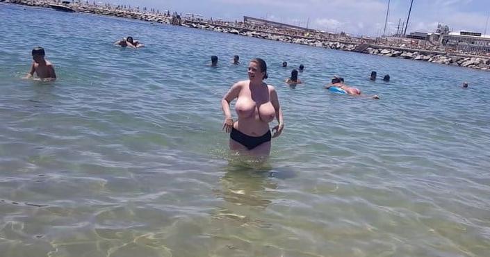 8P Busty topless beach 12