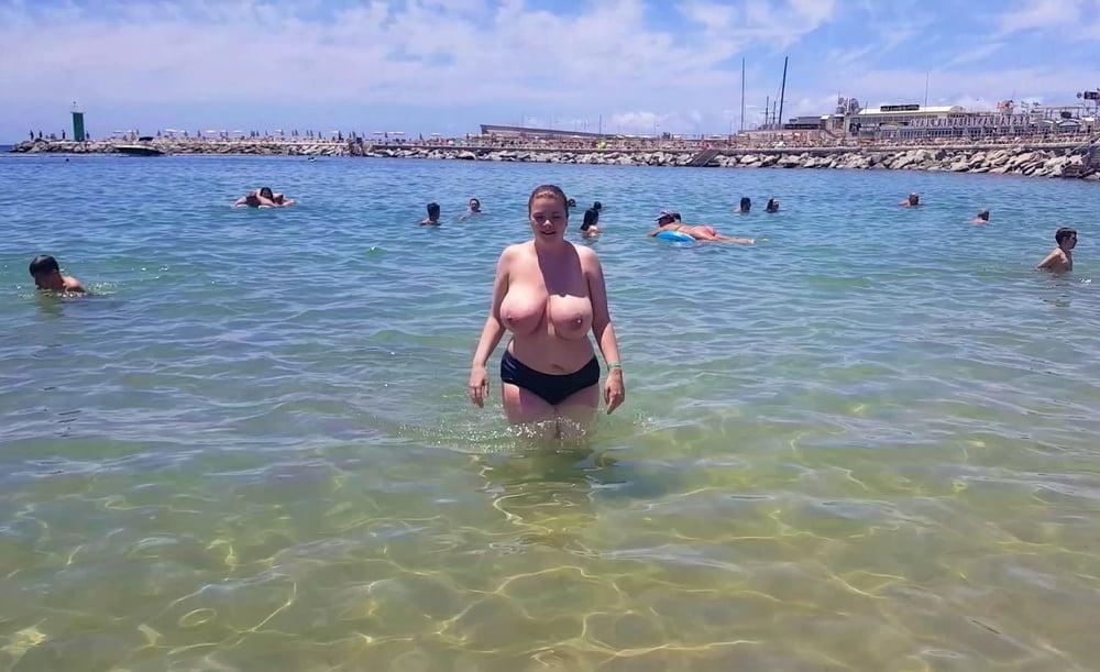 8P Busty topless beach 12