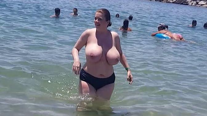 8P Busty topless beach 12