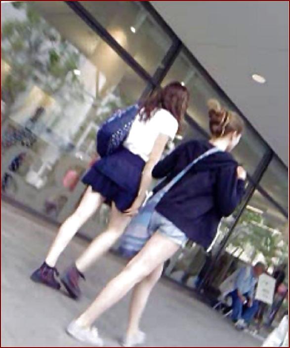 17P So sweet teen with long legs and dark blue tanga