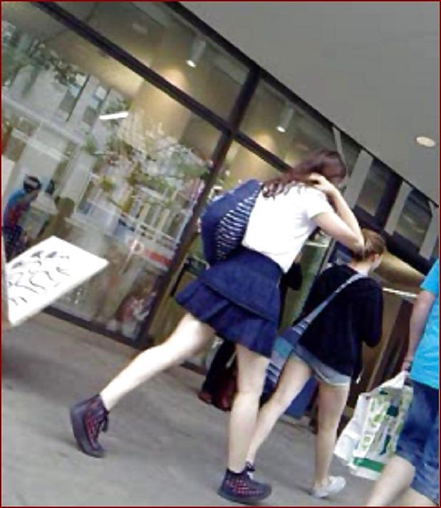 17P So sweet teen with long legs and dark blue tanga