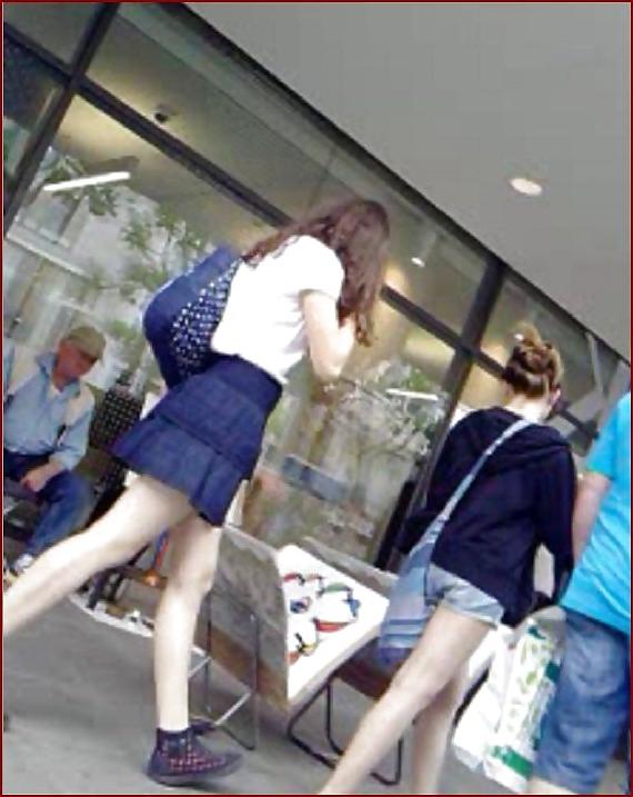 17P So sweet teen with long legs and dark blue tanga