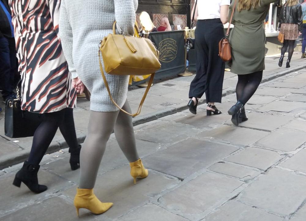 25P blonde in grey dress with grey pantyhose and yellow heels