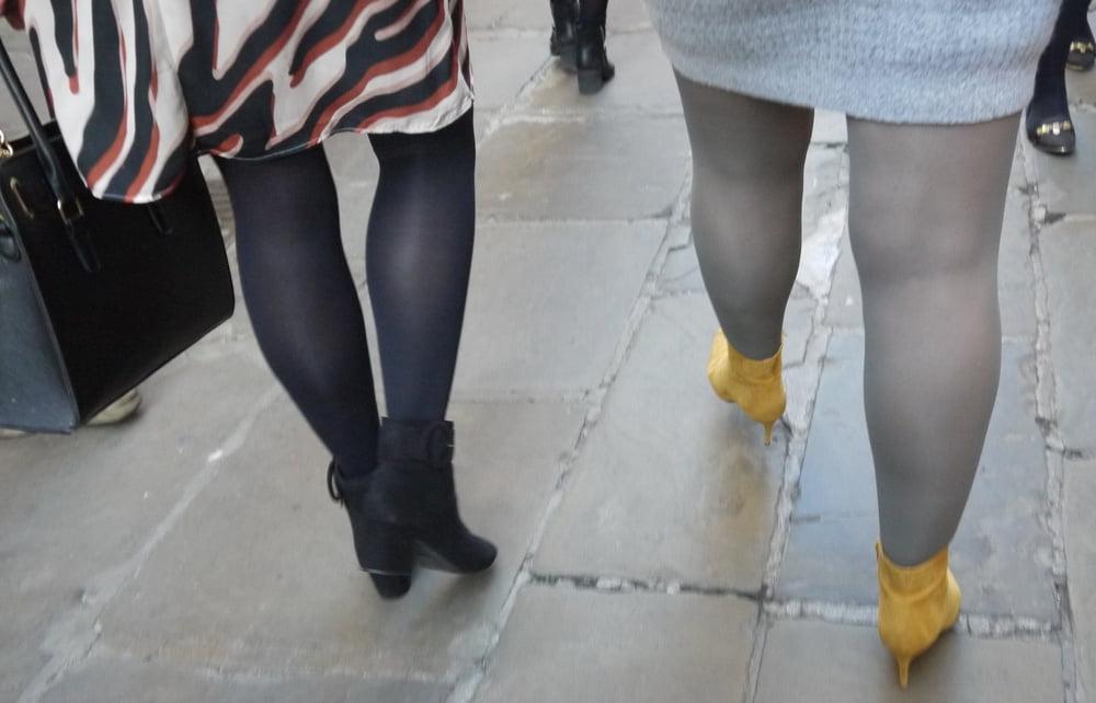 25P blonde in grey dress with grey pantyhose and yellow heels