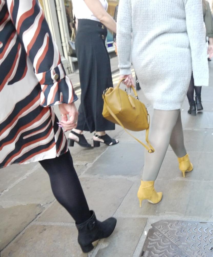 25P blonde in grey dress with grey pantyhose and yellow heels