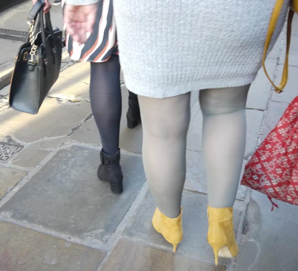 25P blonde in grey dress with grey pantyhose and yellow heels