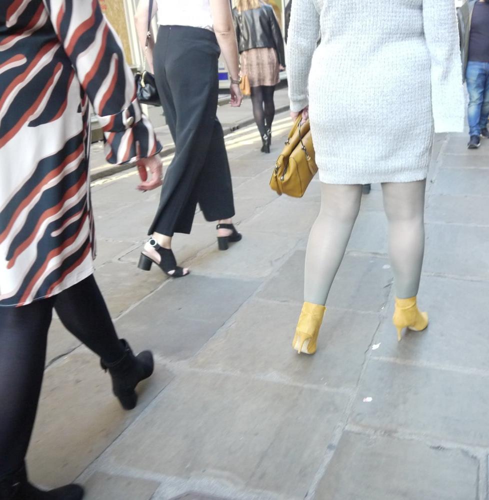 25P blonde in grey dress with grey pantyhose and yellow heels