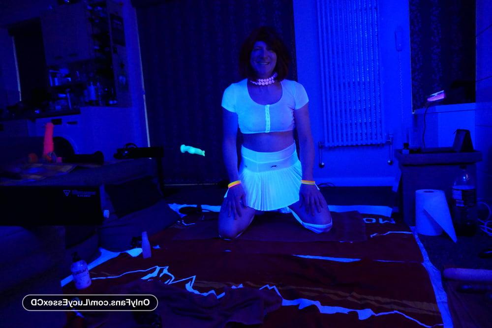 6P Sissy Lucy wearing a glow in the dark chastity cage
