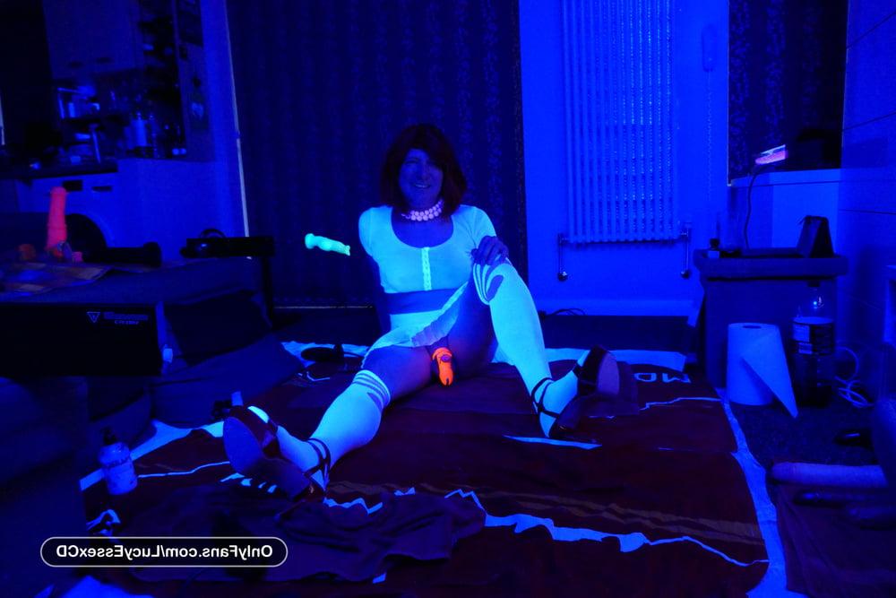 6P Sissy Lucy wearing a glow in the dark chastity cage