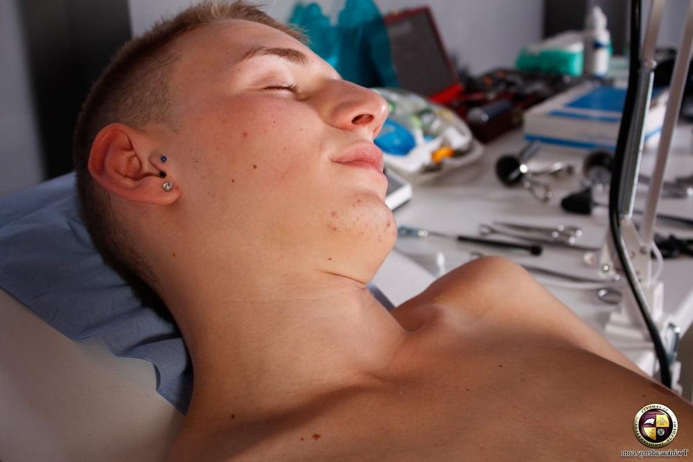 19P The doctor measures the boy's uncircumcised cock