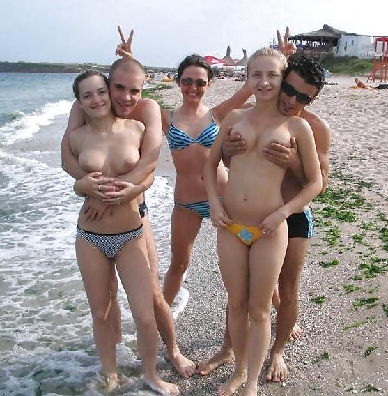 25P Amateurs having fun on the beach