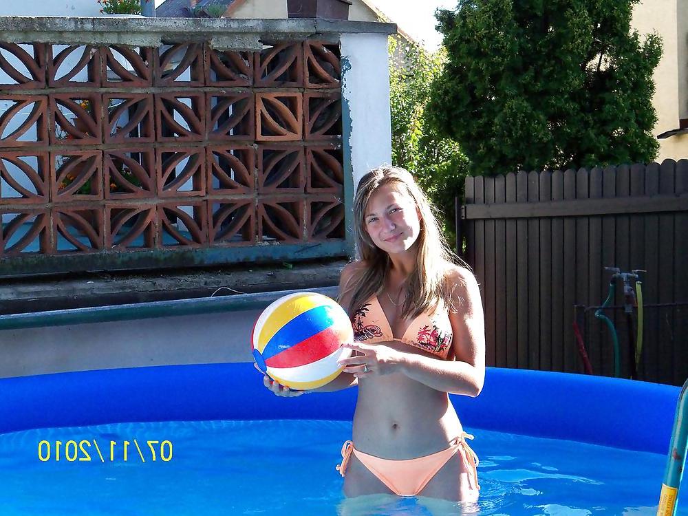 22P Cute Blonde Teen outside in the Garden