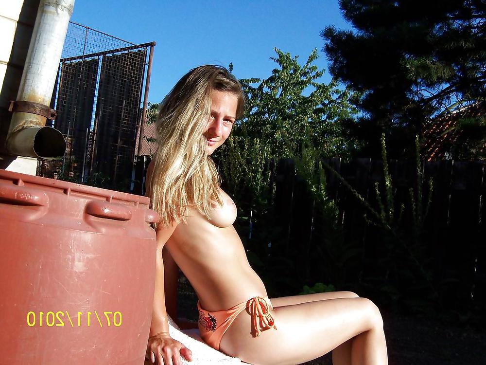 22P Cute Blonde Teen outside in the Garden
