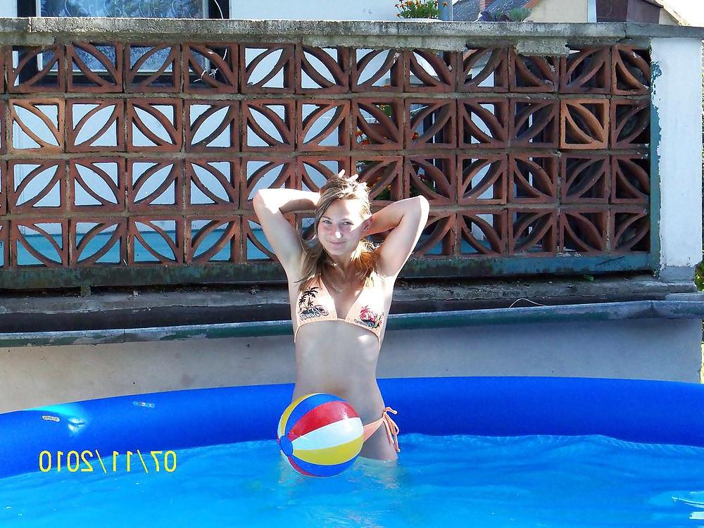 22P Cute Blonde Teen outside in the Garden
