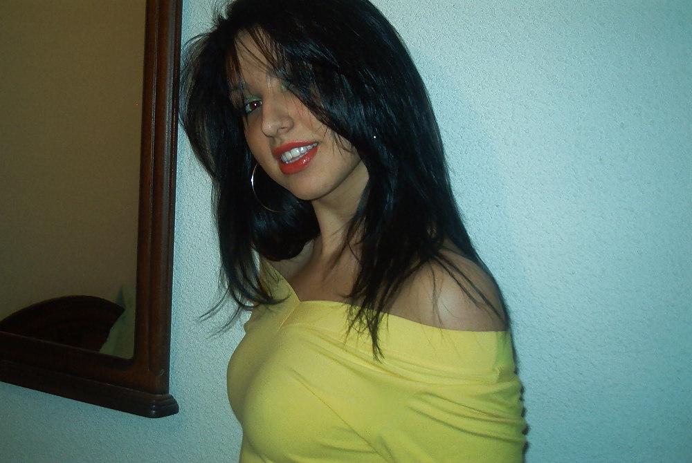 25P Sexy brunette topless at home