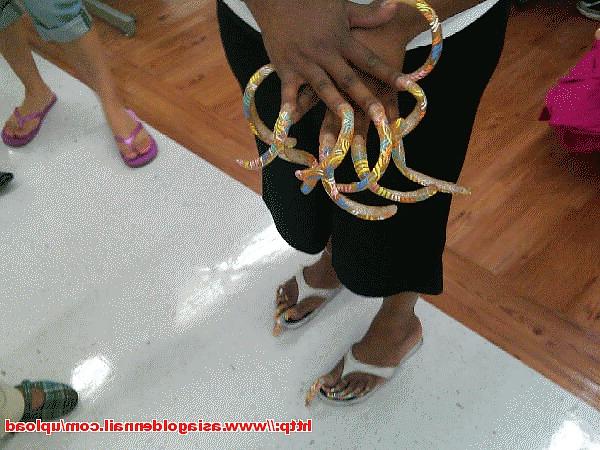 18P Long toenails pics