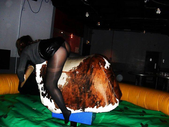 25P Girls Riding The Mechanical Bull