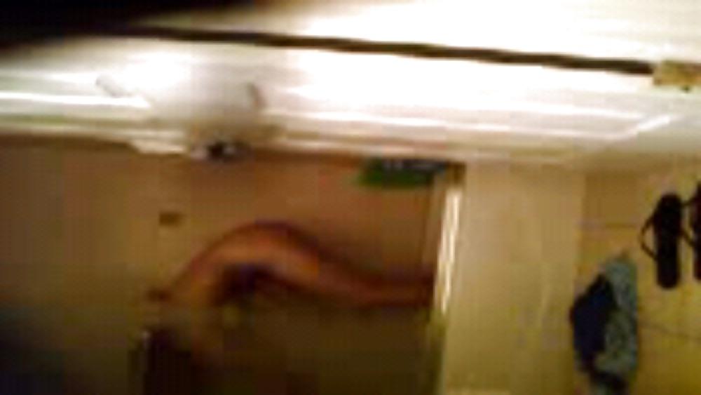 13P Melina taking a shower hidden cam