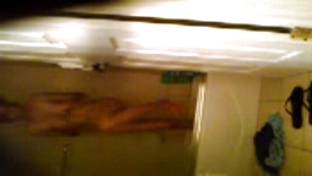 13P Melina taking a shower hidden cam